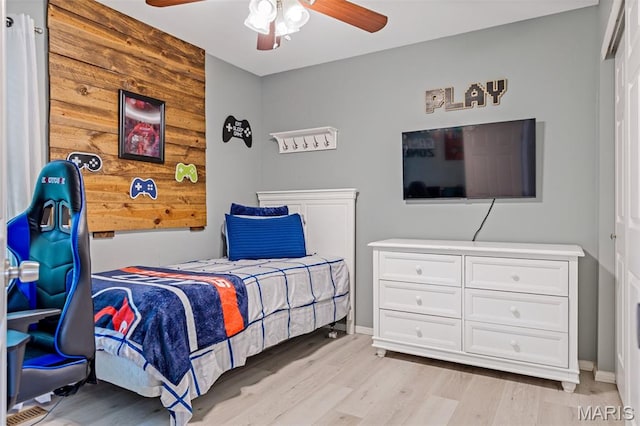 404 Arbor Spring Dr, Ballwin, MO 63021 - bedroom with light wood-type flooring and a ceiling fan