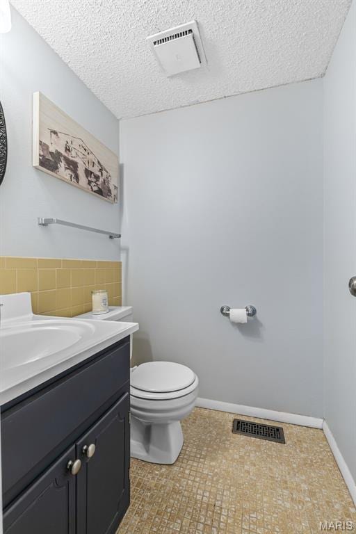 2318 Hidden Meadow Ln, Ballwin, MO 63021 - bathroom with vanity and a textured ceiling