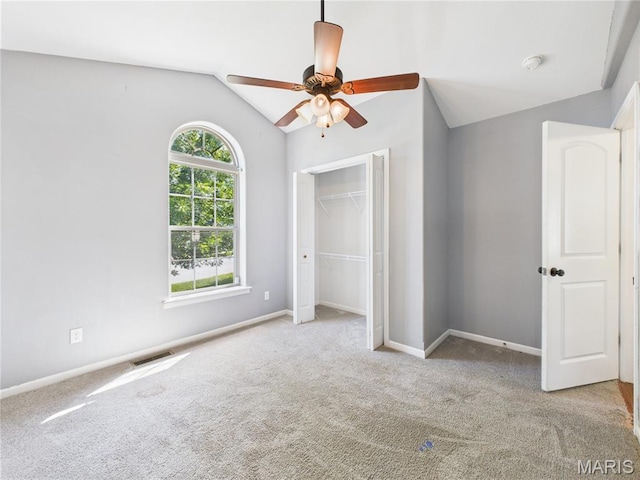 16107 Hummingbird Ln, Saint Robert, MO 65584 - unfurnished bedroom featuring lofted ceiling, carpet, a closet, and ceiling fan