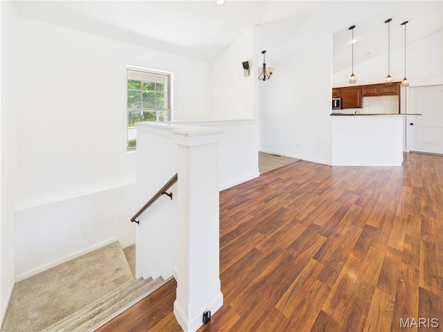 16107 Hummingbird Ln, Saint Robert, MO 65584 - stairs with wood finished floors and lofted ceiling