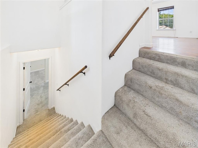 16107 Hummingbird Ln, Saint Robert, MO 65584 - staircase with carpet floors and baseboards