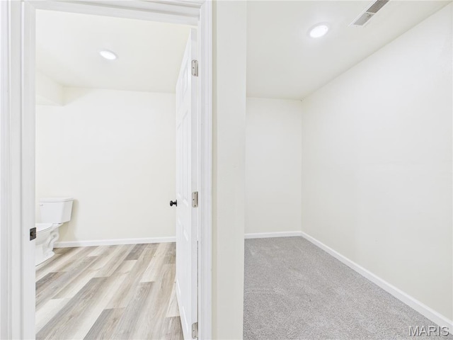 16107 Hummingbird Ln, Saint Robert, MO 65584 - bathroom with wood finished floors and recessed lighting