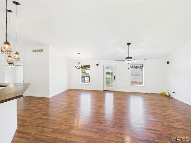 16107 Hummingbird Ln, Saint Robert, MO 65584 - unfurnished living room with a chandelier, dark wood finished floors, and a ceiling fan