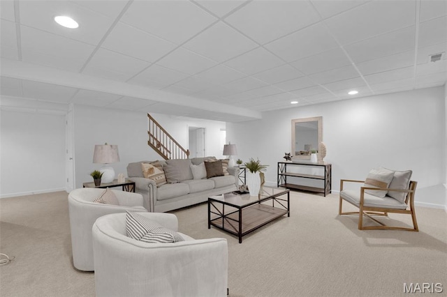 408 Bluff Meadow Dr, Ellisville, MO 63021 - carpeted living room featuring a paneled ceiling, stairs, and recessed lighting