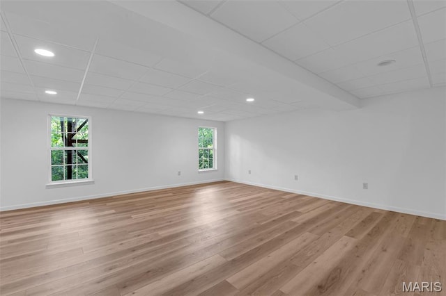 408 Bluff Meadow Dr, Ellisville, MO 63021 - empty room featuring light wood-style floors, recessed lighting, healthy amount of natural light, and a drop ceiling