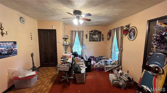 812 S Mine Ln, Motte, Fredericktown, MO 63645 - interior space featuring a ceiling fan and brick floors