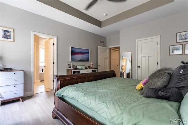 3841 Ember Ct, Edwardsville, IL 62025 - bedroom with light wood-type flooring and ensuite bath