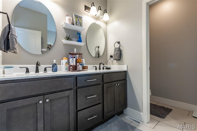 3841 Ember Ct, Edwardsville, IL 62025 - full bath featuring double vanity and tile patterned floors