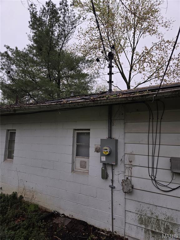 305 W 7th St, Cahokia, IL 62206 - exterior view of electric meter and concrete block siding