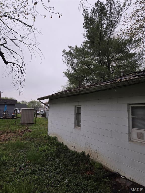 305 W 7th St, Cahokia, IL 62206 - view of side of property with concrete block siding