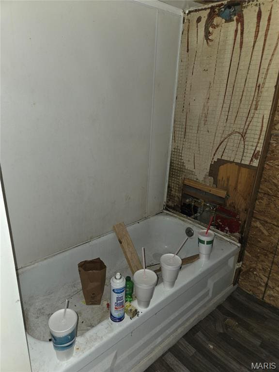 305 W 7th St, Cahokia, IL 62206 - full bath featuring a tub and wood finished floors