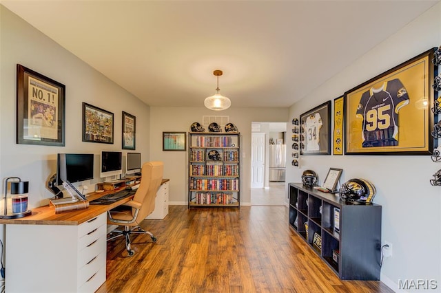 606 Wyndview Dr, Lake St Louis, MO 63367 - office area featuring wood finished floors and baseboards