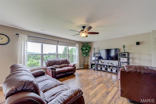 606 Wyndview Dr, Lake St Louis, MO 63367 - living room featuring a ceiling fan and wood finished floors
