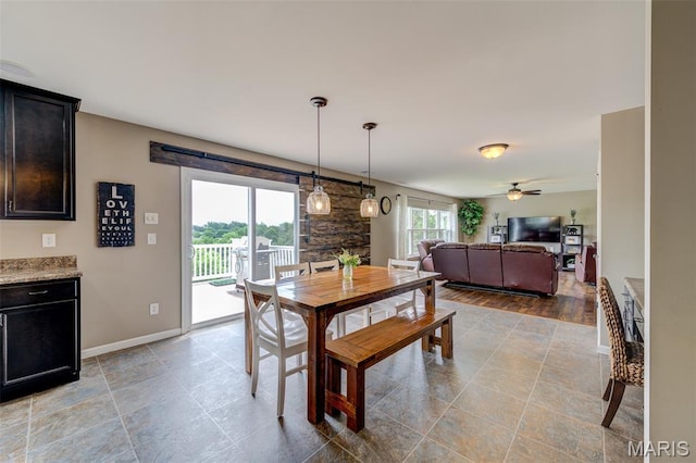 606 Wyndview Dr, Lake St Louis, MO 63367 - dining area with ceiling fan and baseboards