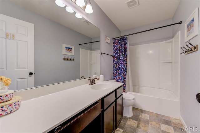 606 Wyndview Dr, Lake St Louis, MO 63367 - full bathroom with stone finish flooring, vanity, and shower / bathtub combination with curtain