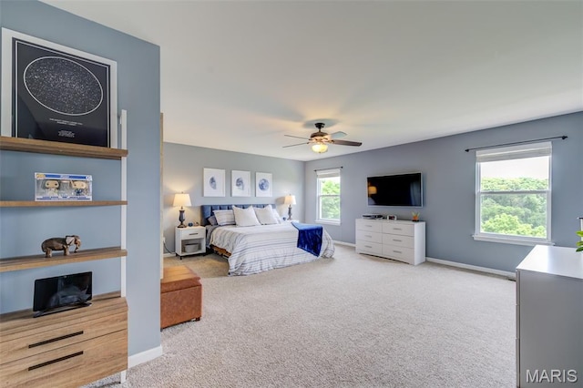 606 Wyndview Dr, Lake St Louis, MO 63367 - carpeted bedroom with baseboards and ceiling fan