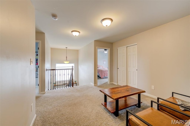 606 Wyndview Dr, Lake St Louis, MO 63367 - corridor featuring carpet floors and an upstairs landing