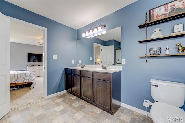 606 Wyndview Dr, Lake St Louis, MO 63367 - ensuite bathroom with stone finish flooring and double vanity