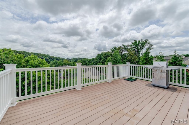 606 Wyndview Dr, Lake St Louis, MO 63367 - wooden deck with a grill