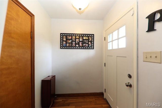 2909 Grand Ave, Granite City, IL 62040 - doorway featuring dark wood-type flooring and baseboards