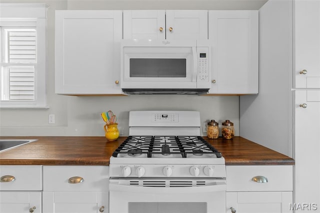 3119 Tamm Ave, Saint Louis, MO 63139 - kitchen featuring white appliances, wood counters, white cabinets, and healthy amount of natural light