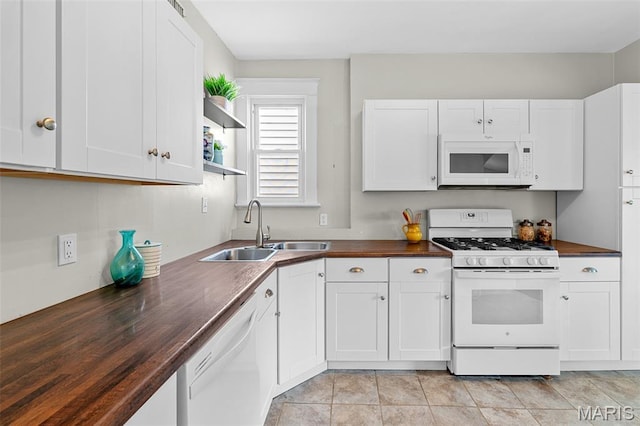 3119 Tamm Ave, Saint Louis, MO 63139 - kitchen featuring white appliances, wooden counters, white cabinets, and open shelves
