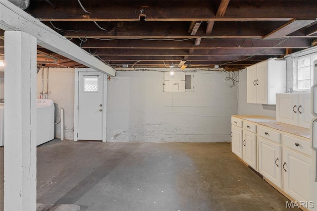 3119 Tamm Ave, Saint Louis, MO 63139 - basement featuring washer and clothes dryer