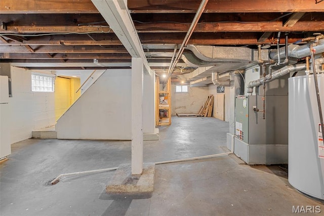 3119 Tamm Ave, Saint Louis, MO 63139 - basement featuring gas water heater and heating unit