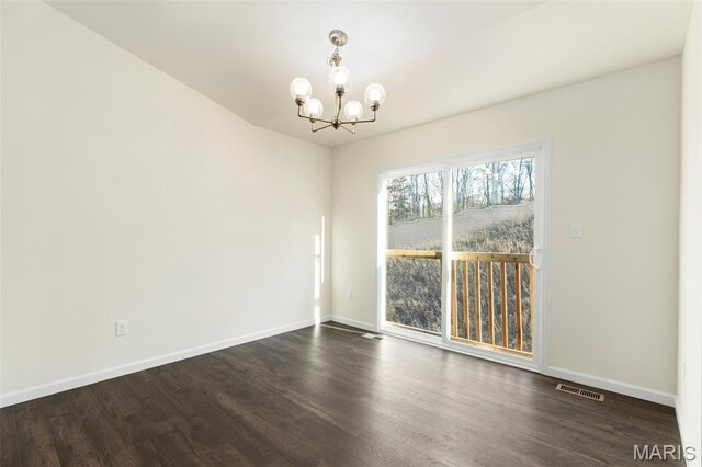 4939 Knotty Alder Dr, Imperial, MO 63052 - spare room featuring a chandelier and dark wood-style floors