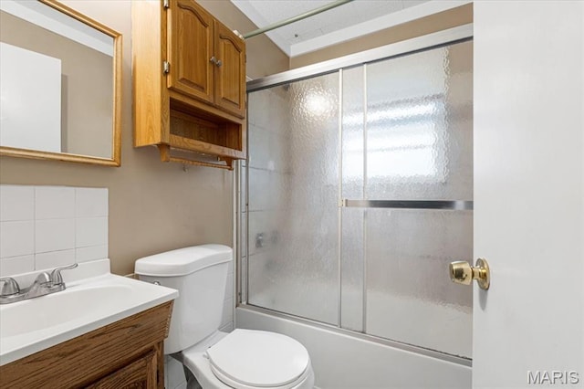 12 Mcnulty Dr, Florissant, MO 63031 - full bath featuring shower / bath combination with glass door, vanity, and tasteful backsplash