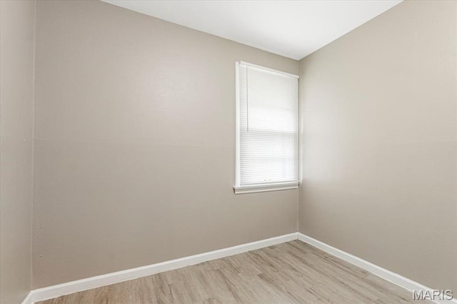 12 Mcnulty Dr, Florissant, MO 63031 - unfurnished room featuring light wood finished floors and baseboards
