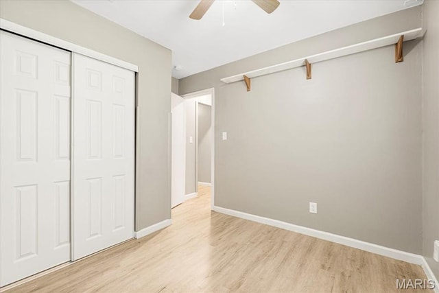 12 Mcnulty Dr, Florissant, MO 63031 - unfurnished bedroom with light wood-style flooring, a closet, and ceiling fan