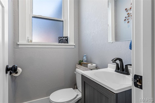 402 S Walker St, Montgomery City, MO 63361 - half bath featuring vanity and a textured wall