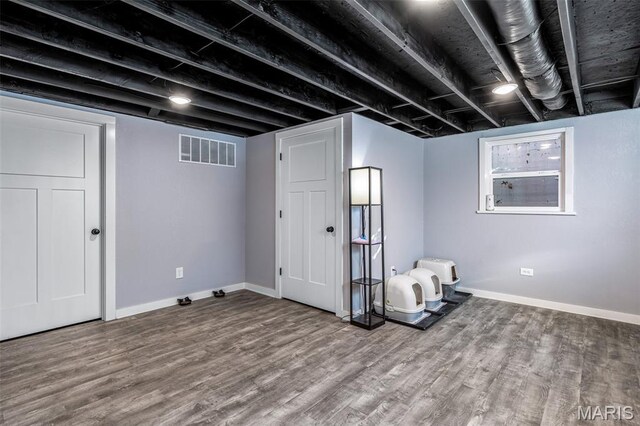 402 S Walker St, Montgomery City, MO 63361 - finished basement featuring wood finished floors and baseboards