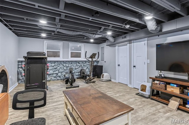 402 S Walker St, Montgomery City, MO 63361 - workout area with light wood-style floors and electric panel
