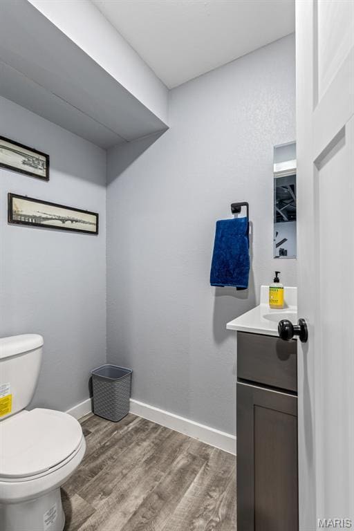 402 S Walker St, Montgomery City, MO 63361 - bathroom with vanity and wood finished floors