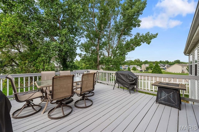 924 Tower Pl, Ofallon, MO 63366 - wooden terrace with outdoor dining space and grilling area