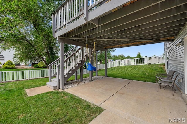924 Tower Pl, Ofallon, MO 63366 - fenced backyard with a patio area and stairway