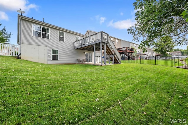 924 Tower Pl, Ofallon, MO 63366 - back of house with a wooden deck and stairs