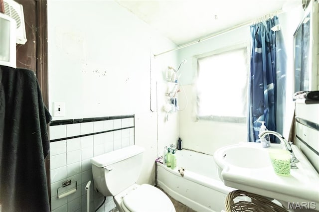 129 Maple Ave, Licking, MO 65542 - bathroom with wainscoting, shower / bath combination, and tile walls