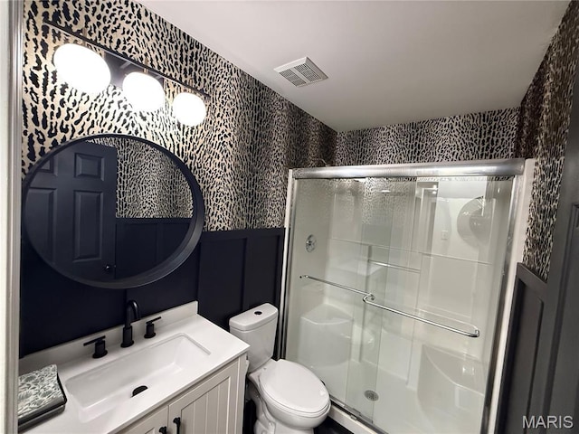 740 Shadow Pine Dr, Fenton, MO 63026 - bathroom featuring wallpapered walls, a shower stall, and vanity