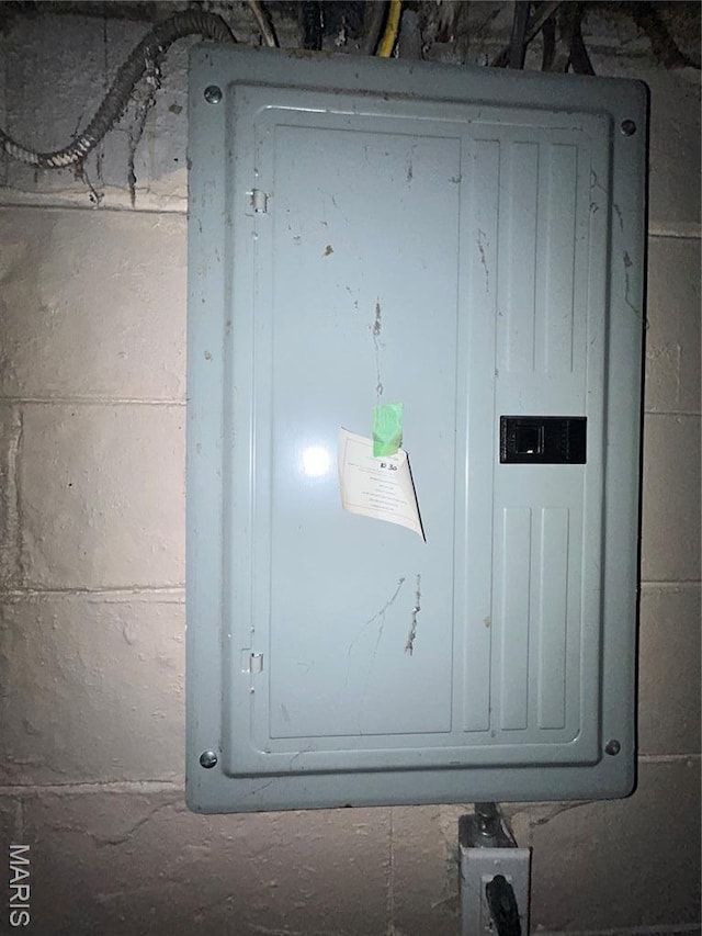 7155 Theodore Ave, Jennings, MO 63136 - utility room featuring electric panel