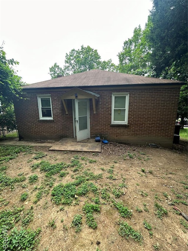 7155 Theodore Ave, Jennings, MO 63136 - back of property with brick siding