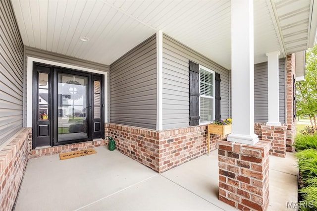 812 Green Jacket Way, Ofallon, IL 62269 - view of exterior entry with a porch and brick siding