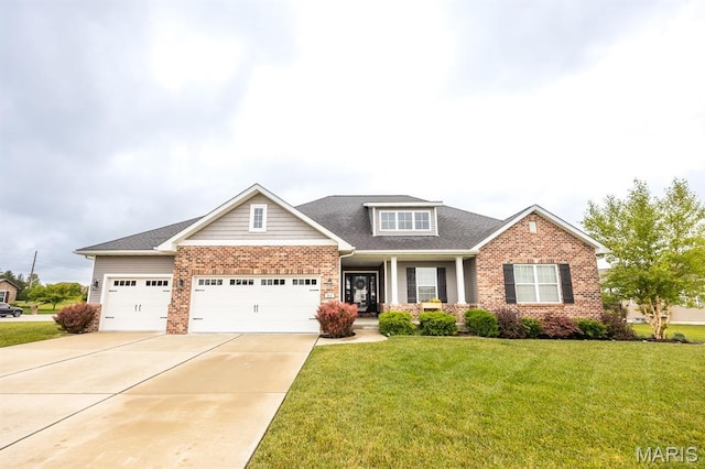 812 Green Jacket Way, Ofallon, IL 62269 - craftsman-style house featuring brick siding, a garage, a front lawn, concrete driveway, and roof with shingles