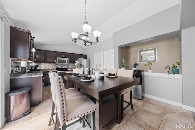 80 Brookshire Creek Dr, Wentzville, MO 63385 - dining room featuring vaulted ceiling, a chandelier, and light tile patterned floors