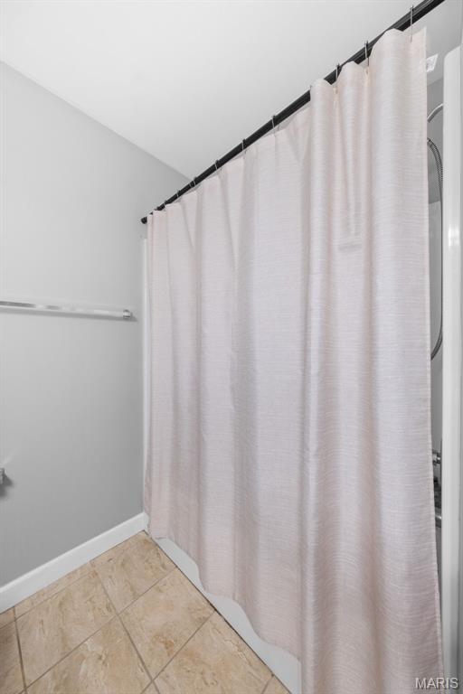 80 Brookshire Creek Dr, Wentzville, MO 63385 - full bathroom featuring tile patterned floors and baseboards