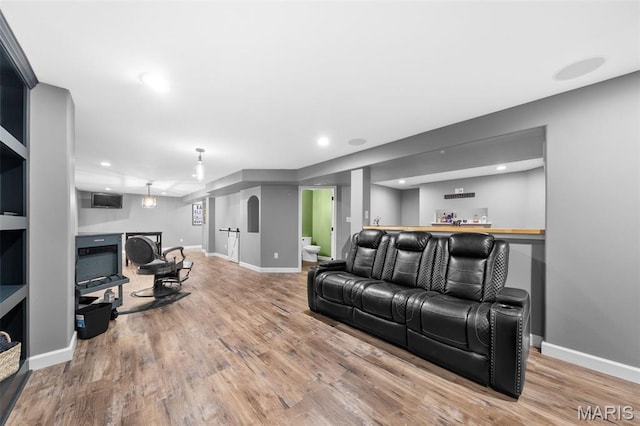 80 Brookshire Creek Dr, Wentzville, MO 63385 - living area with a bar, wood finished floors, and recessed lighting
