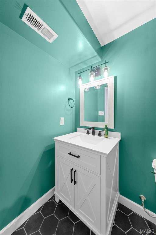 80 Brookshire Creek Dr, Wentzville, MO 63385 - half bath with vanity and tile patterned floors