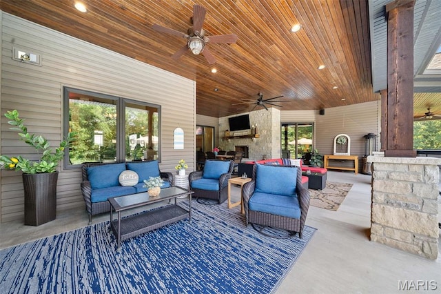 32 Taylors Way, Foristell, MO 63348 - view of patio / terrace featuring ceiling fan and an outdoor living space with a fireplace